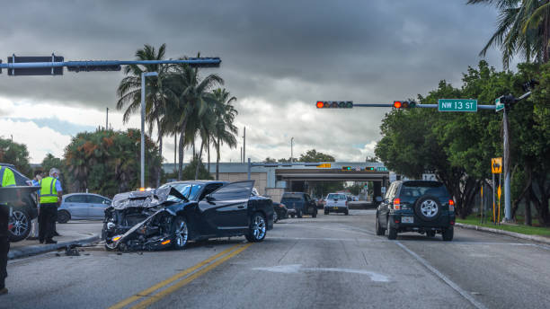 Medical personnel treating an injured patient following a serious vehicle collision